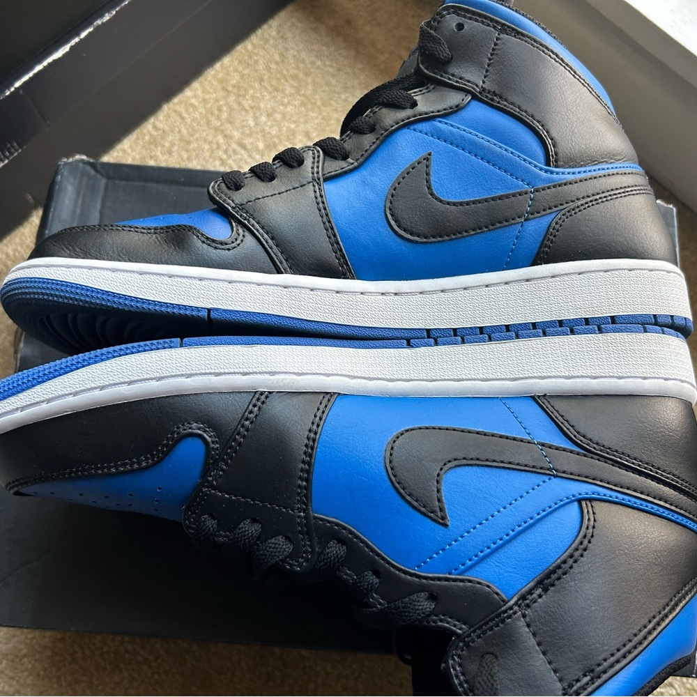 Jordan 1s Black and Blue High-Top Sneakers